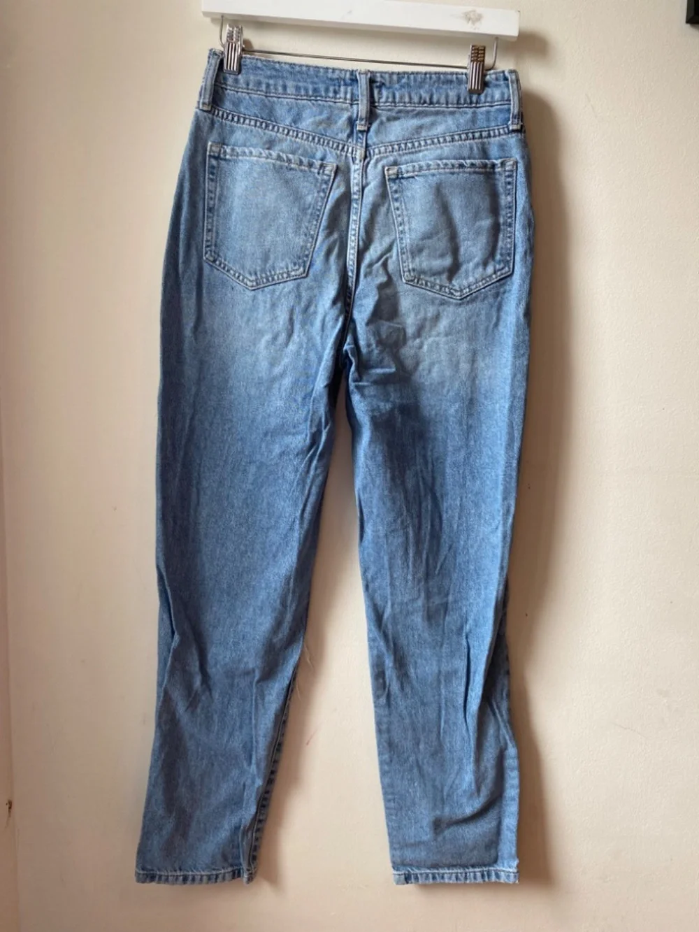 High waisted distressed jeans